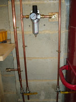 The inlet to the airline, another outlet and the final drain tube